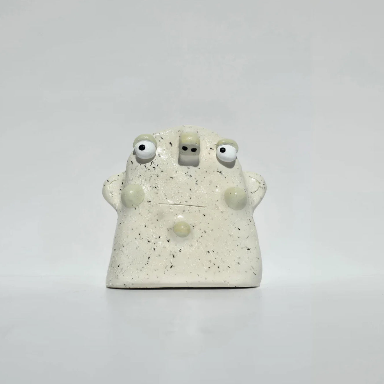Speckled glasses holder