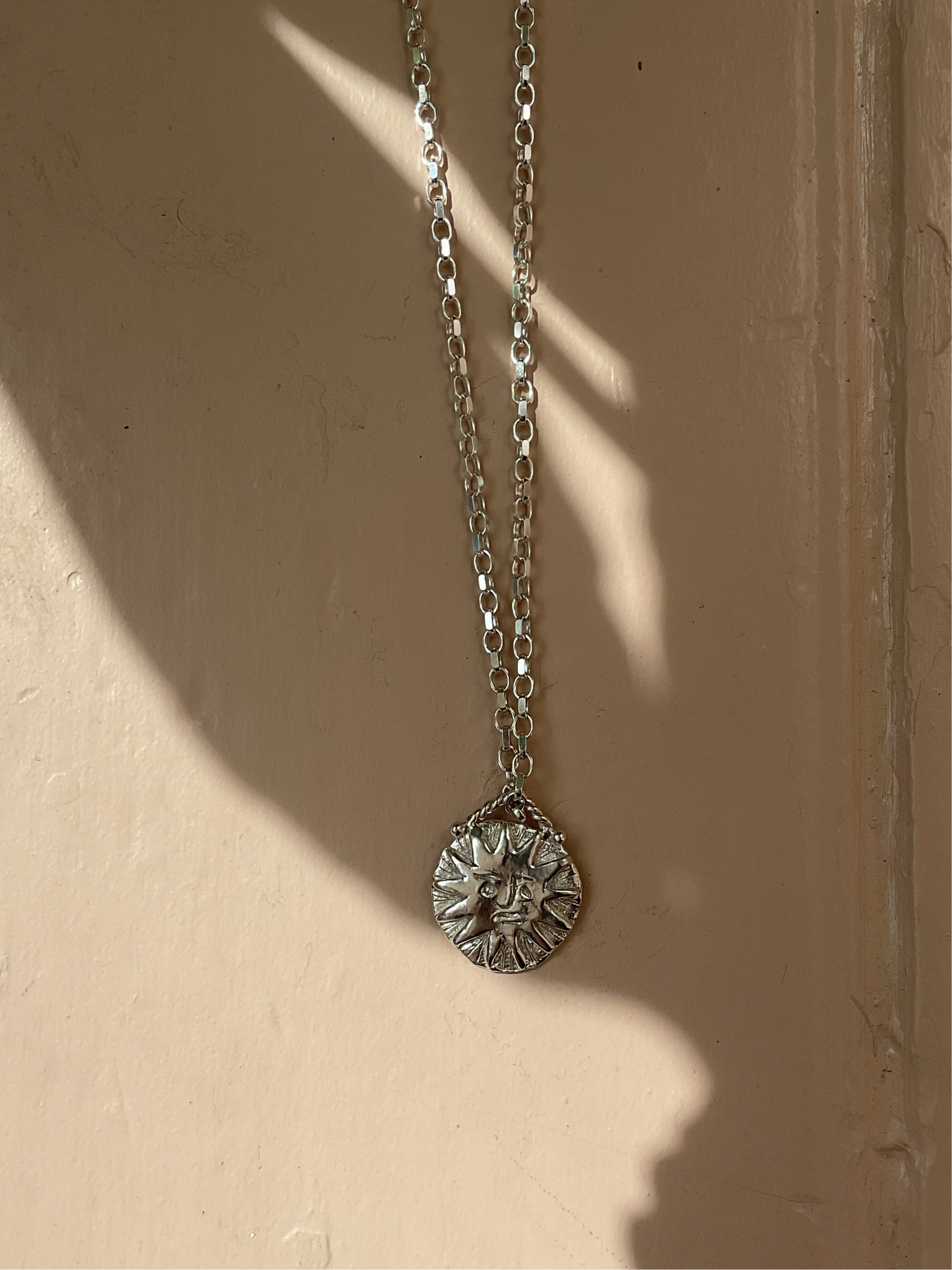 Sun Medallion
