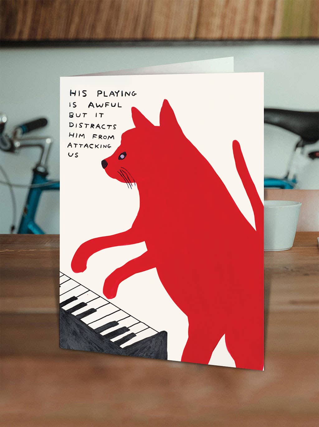 Greetings Card By David Shrigley - Piano Playing Cat