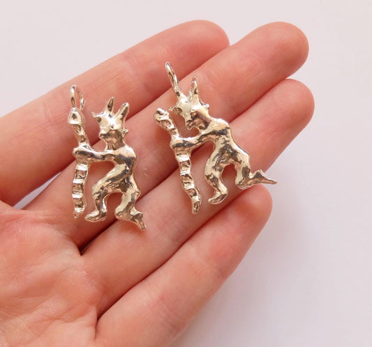 Demon with snake charm, bronze