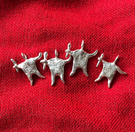 Blemmyae charm, Silver